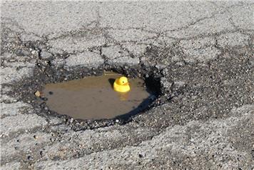 Report a Pot hole or Fly Tipping