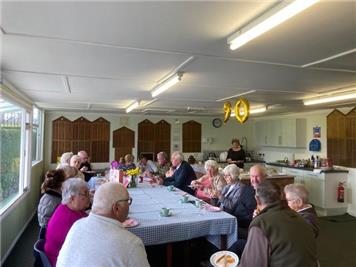 Members enjoying the buffet. - Betty's 90th