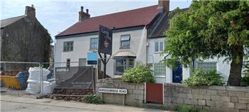 LAMB AND FLAG SIGN GOES IN THE SKIP