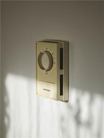Image of a beige coloured analogue thermostat on a wall. Photo by Will on Unsplash. - Alternative Fuel Payment (apply before 31st May 2023)