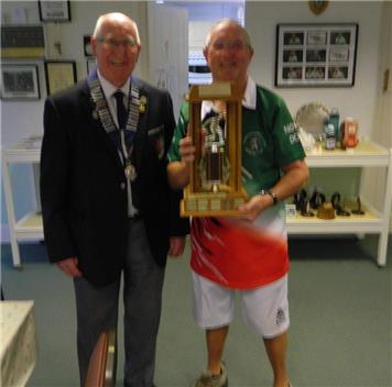 President Jack Bilby presents the Farley Trophy to Glyn Lawrence of North Down - Farley Trophy