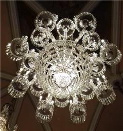 Three down, four to go, chandelier project nears halfway mark