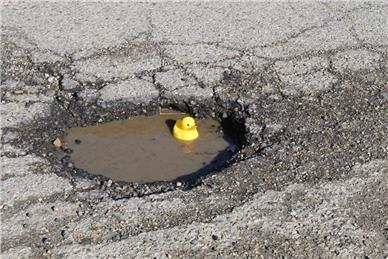  - Report a Pot hole or Fly Tipping