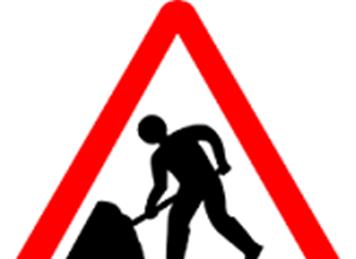 Roadworks sign - Road Closures in October 2023