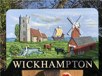 The Fall and Rise of a Village Sign