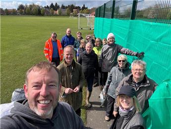 Chair Jon Pimley and other club members getting the courts ready for the new season!