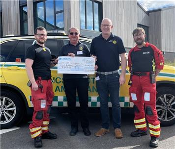 Handing over the cheque to the Doctor and Paramedic  - Lincs & Notts Air Ambulance