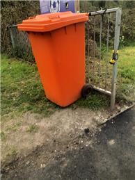 Orange Wheelie Bin at the Heathside