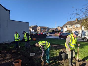digging and weeding - Green Volunteering has started on the Pocket Park