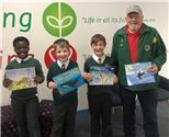 Boroughbridge Lions buy and present books for three Ripon Primary Schools